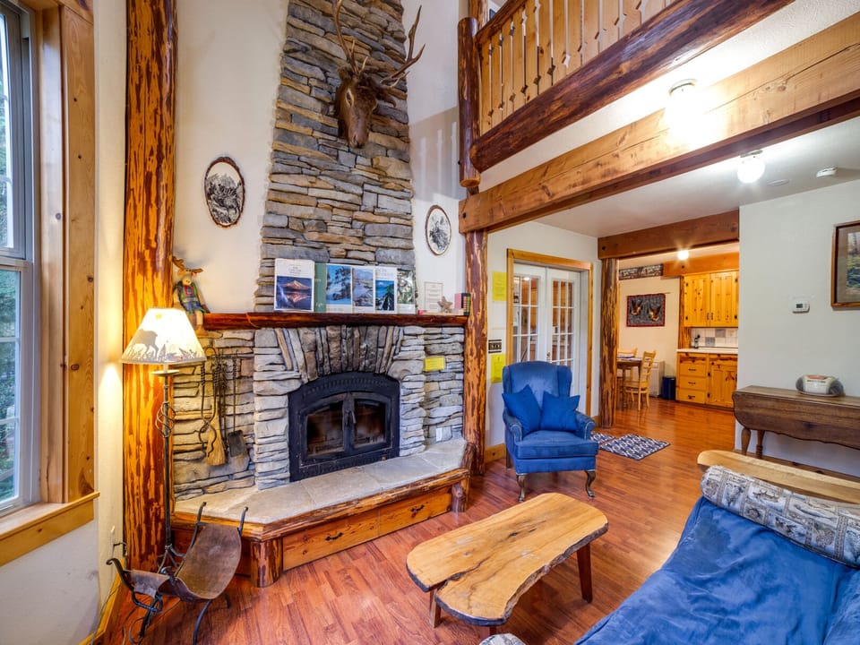Living room with wood burning fireplace