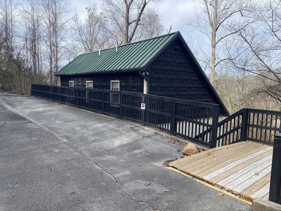 Front of house and parking area.