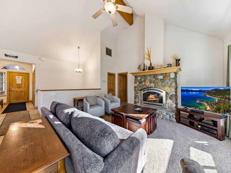 Upstairs Living Room with Comfy Seating and Gas Fireplace