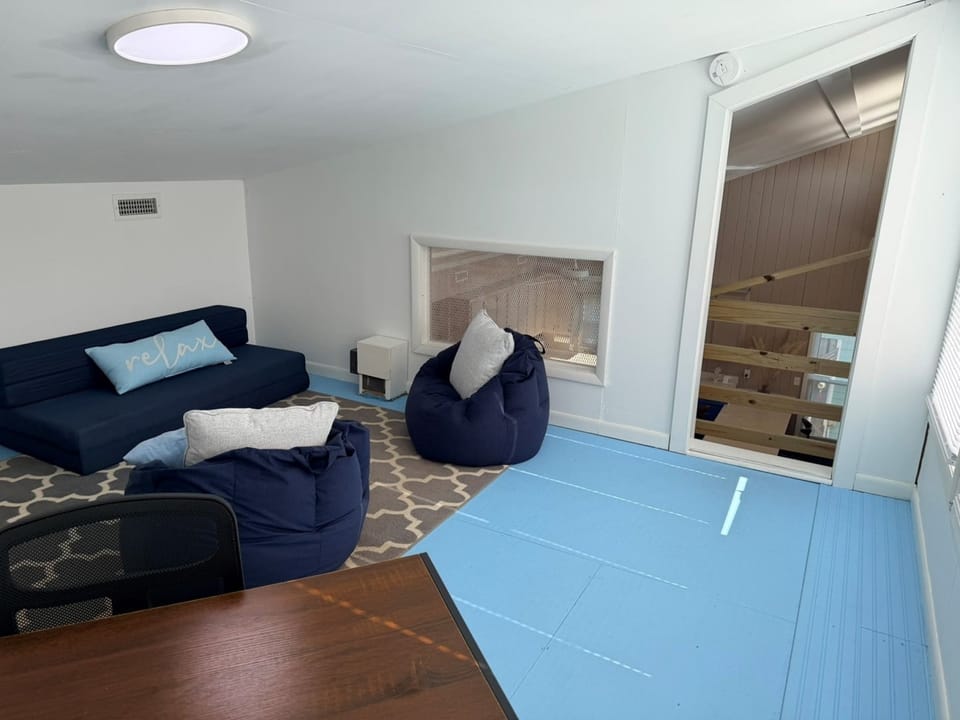 Alt. View of Loft Sitting Area of How Sweet The Sound