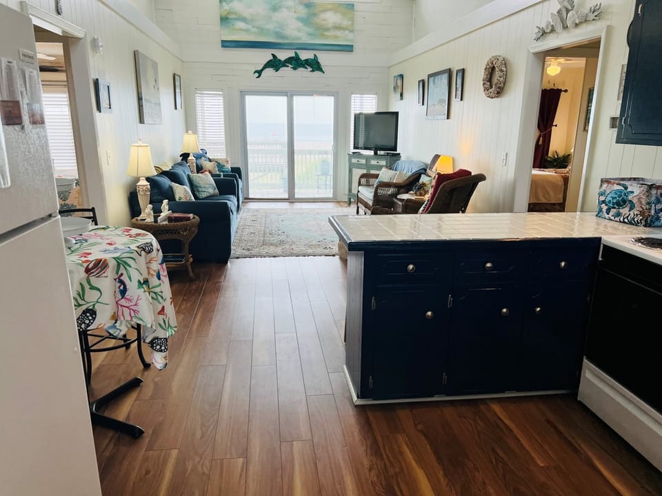 Kitchen to Living Area View with Oceanside Deck Door