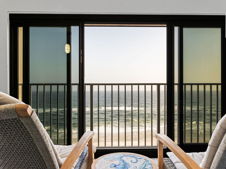 Enjoy sweeping views and the soothing sounds of the Gulf from the enclosed Gulf-front balcony.
