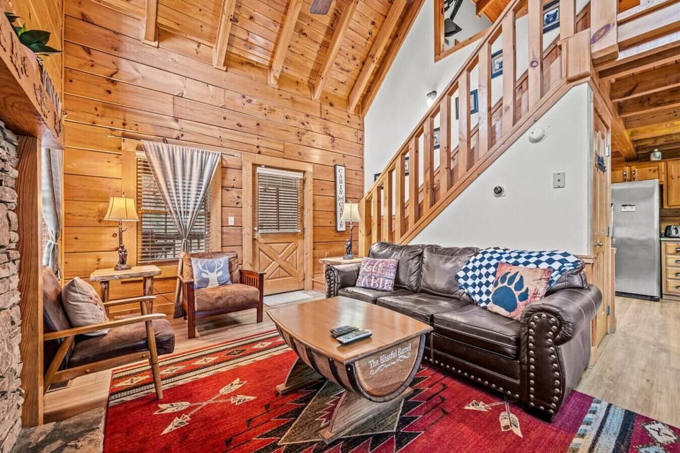 High cathedral ceilings and lots of windows allow lots of natural light into the cabin.