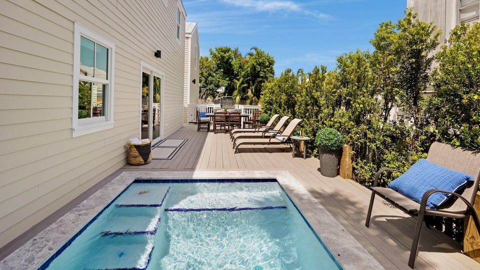 This unique compound features 2 private pools...