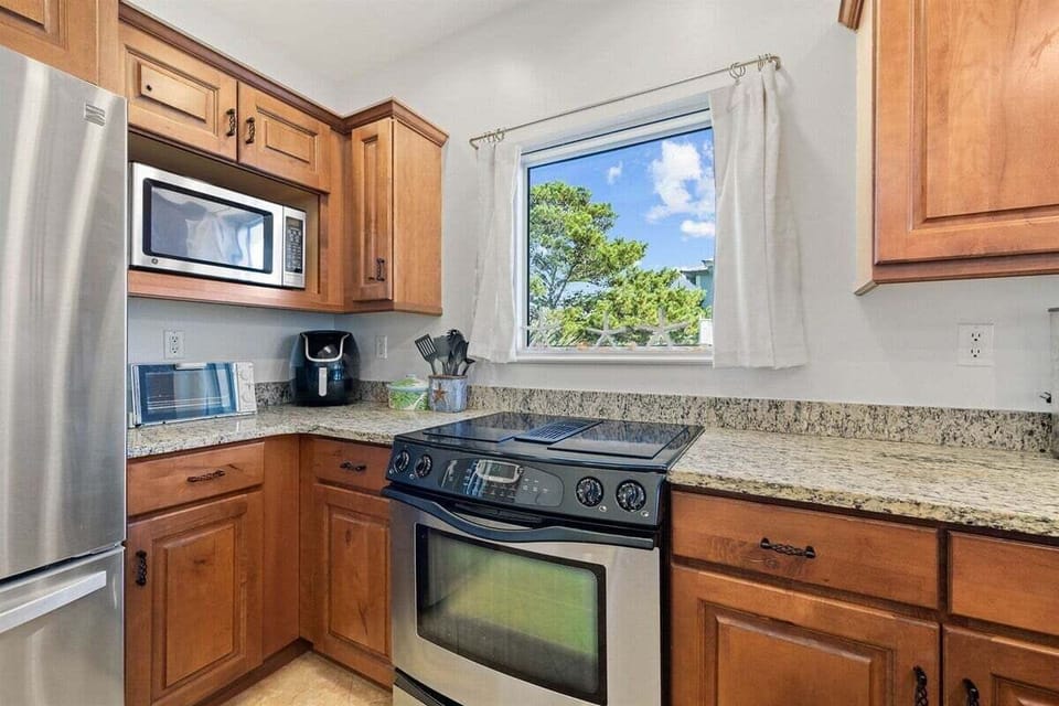 Fully equipped with stainless appliances and natural light.