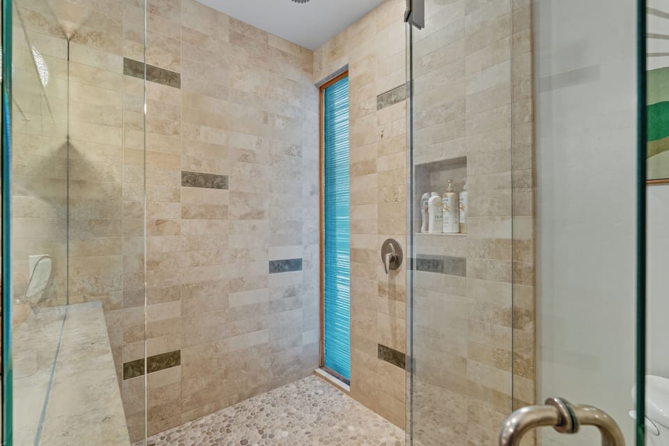 private ensuite with a rainfall shower & double-sink vanity