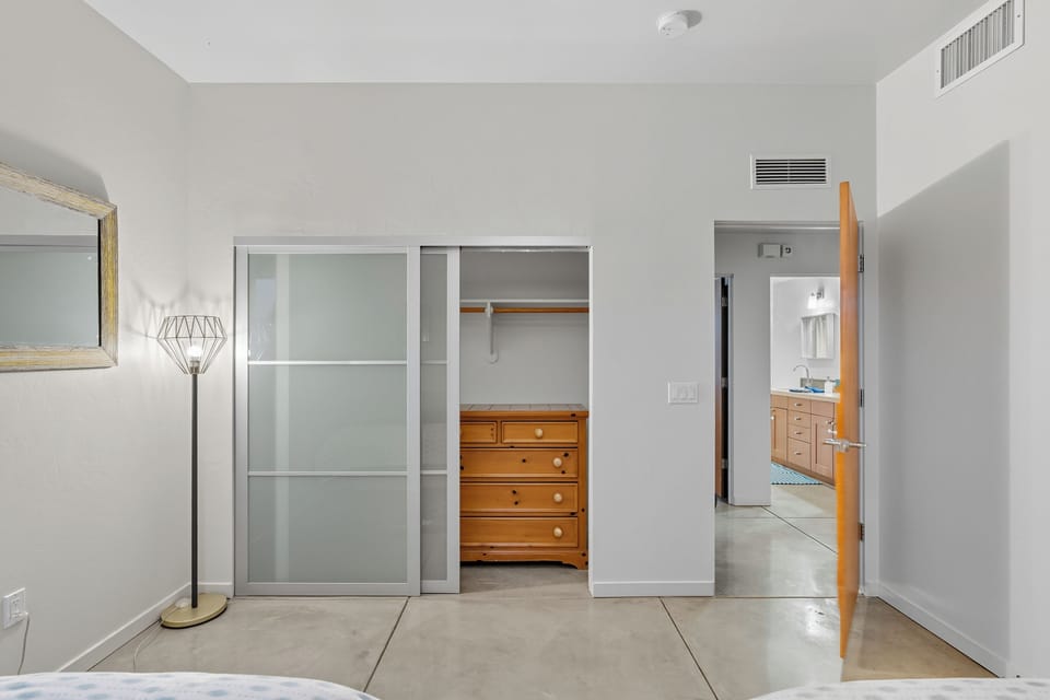 First guest room includes two queen beds