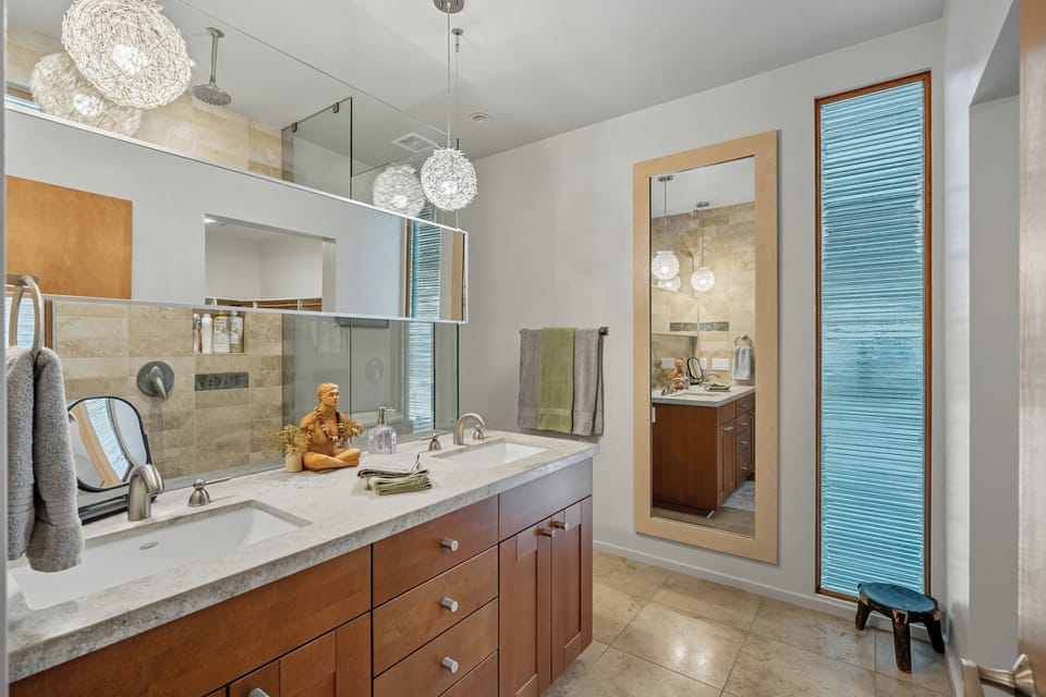 private ensuite with a rainfall shower & double-sink vanity