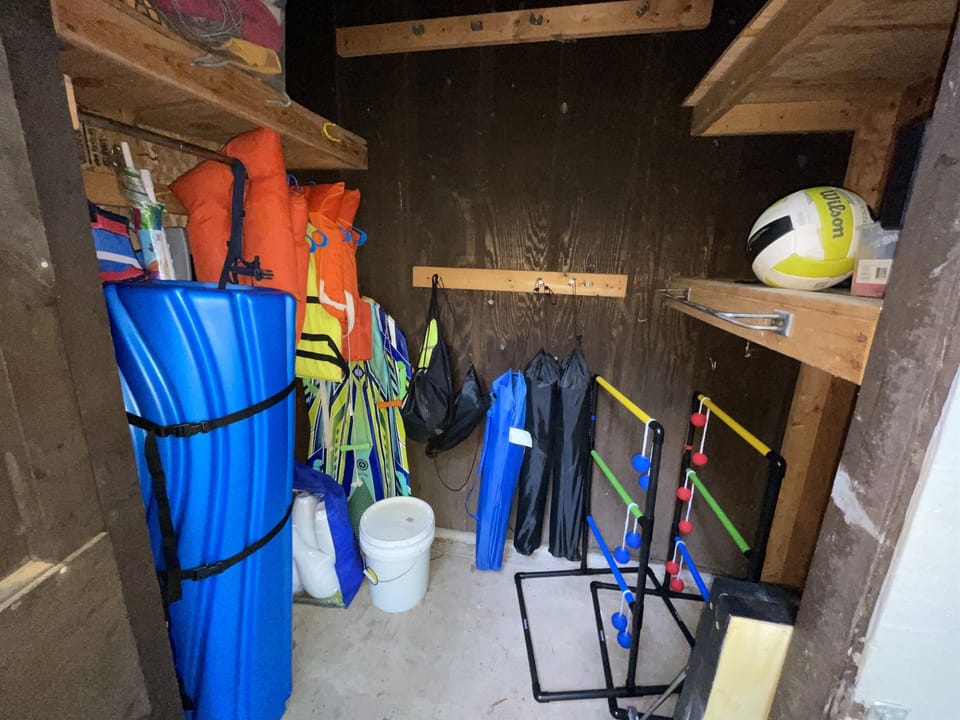 Shed with life jackets and other outdoor items (float mat no longer available)