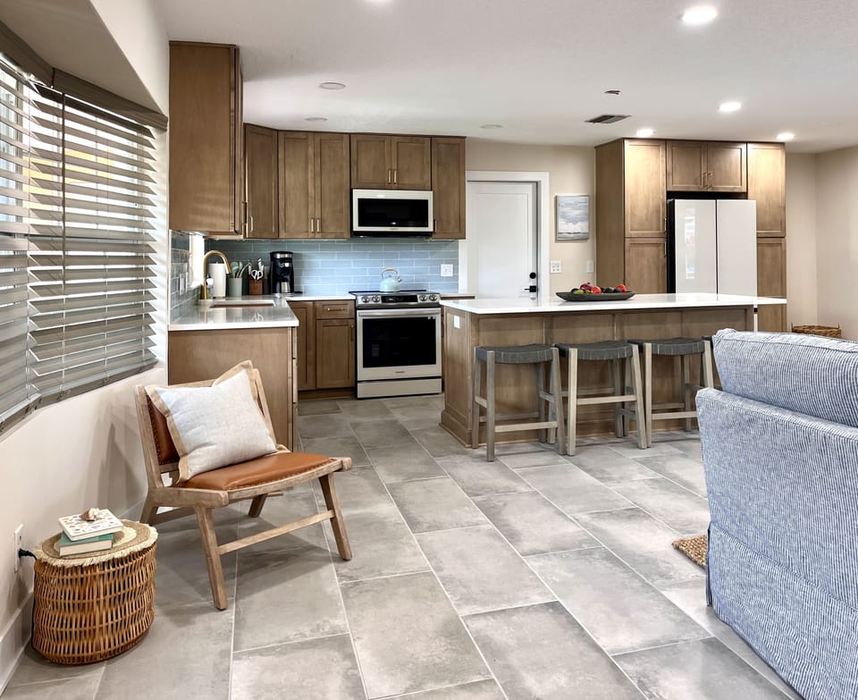Entry: spacious open concept living room and kitchen