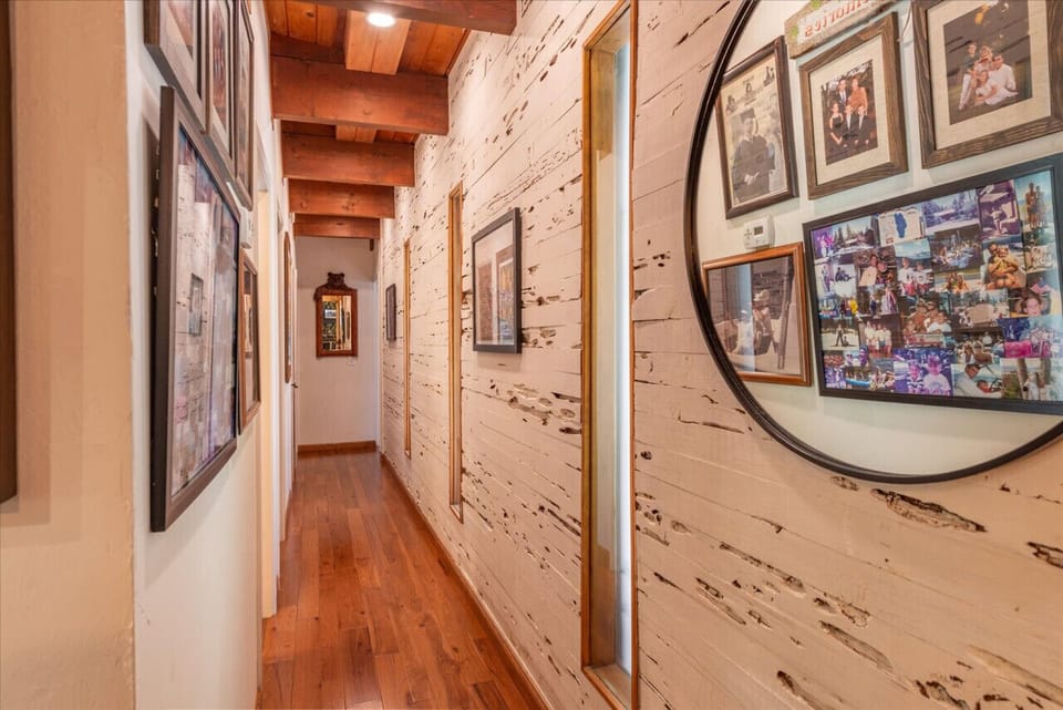Most of house, except for 1 bedroom, is all on the same level (ground level.)Hallway where 3 of the 4 bedrooms are.