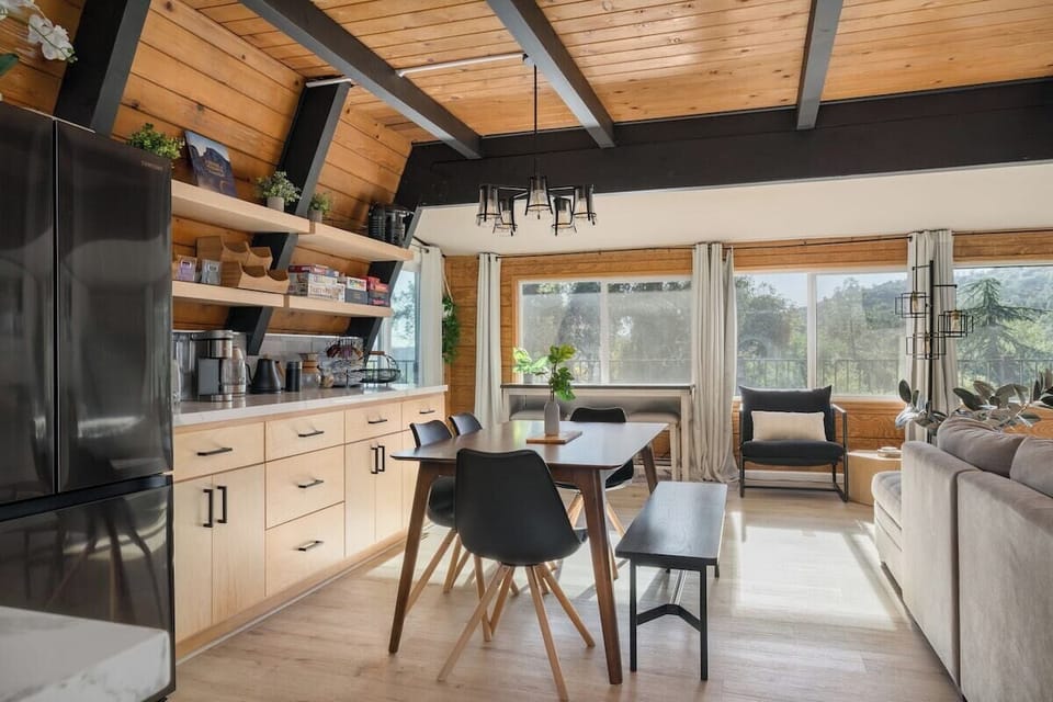 Dining Room: Enjoy breathtaking views and modern charm as you dine in style!