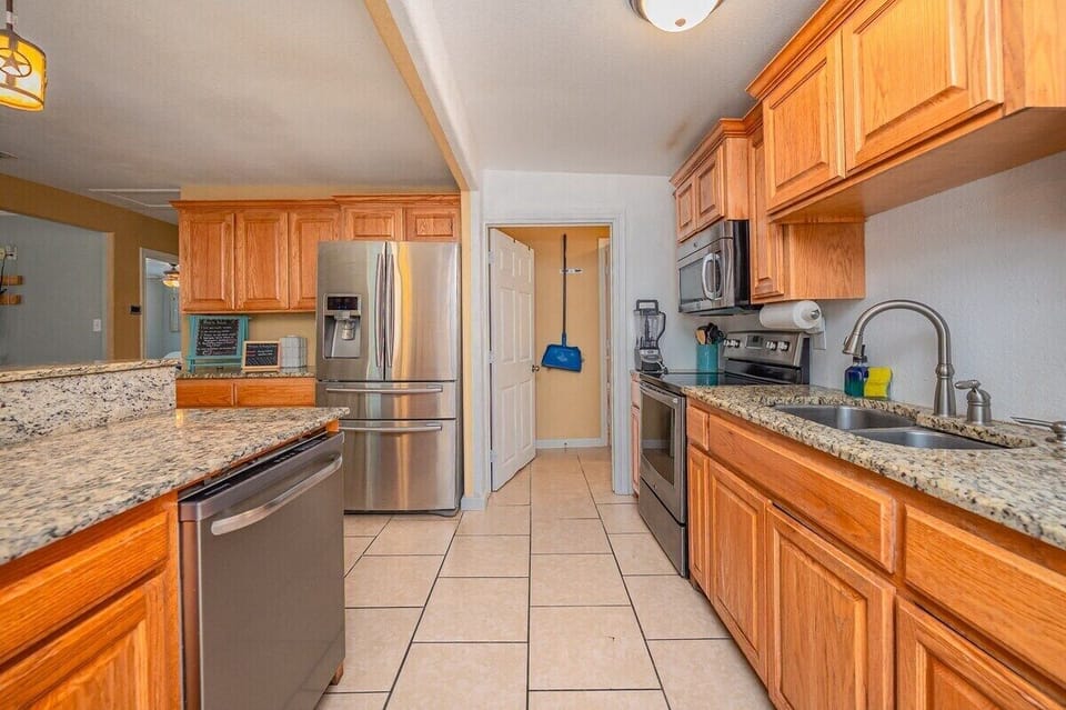 Your culinary haven. Cook up something delicious. Whip up a feast in this well-equipped kitchen. The perfect space for creating culinary masterpieces.