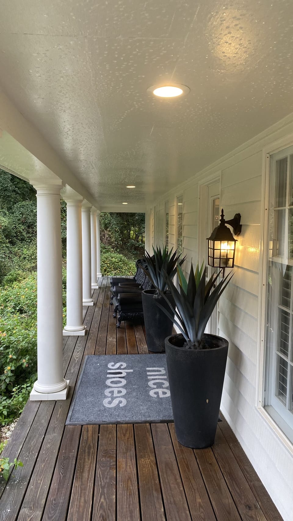Welcome to the porch - surrounded by delicate flowers the butterflies love. 