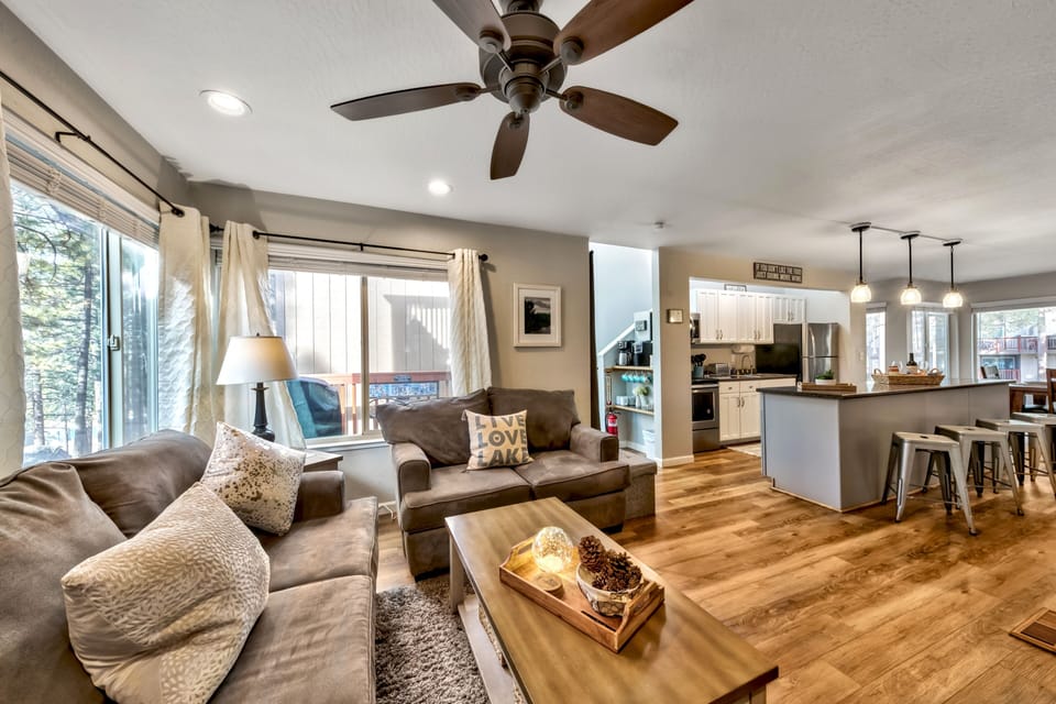 Living room, sofa, loveseat, chair, fireplace, ceiling fan 