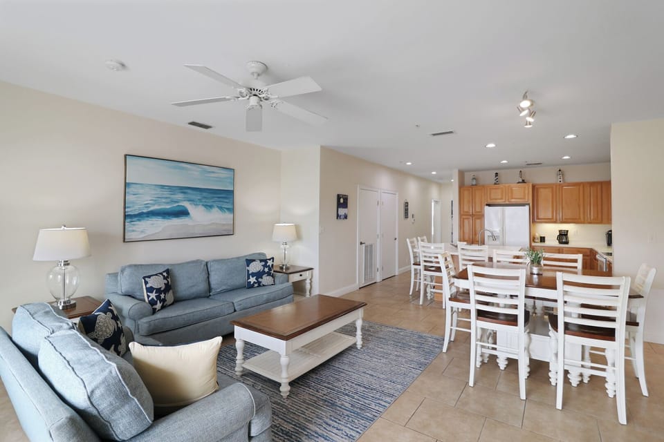 Open floor concept showing the living area, dining room, and kitchen