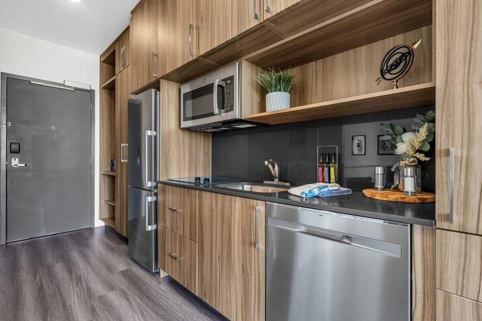 The fully stocked kitchen has stainless steel appliances, Nespresso, a toaster oven, and basic cookware so you can easily prepare delicious meals.