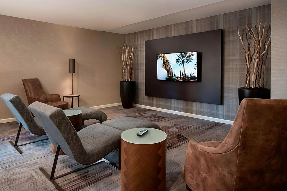 Kick back on plush loungers for a cozy movie night.