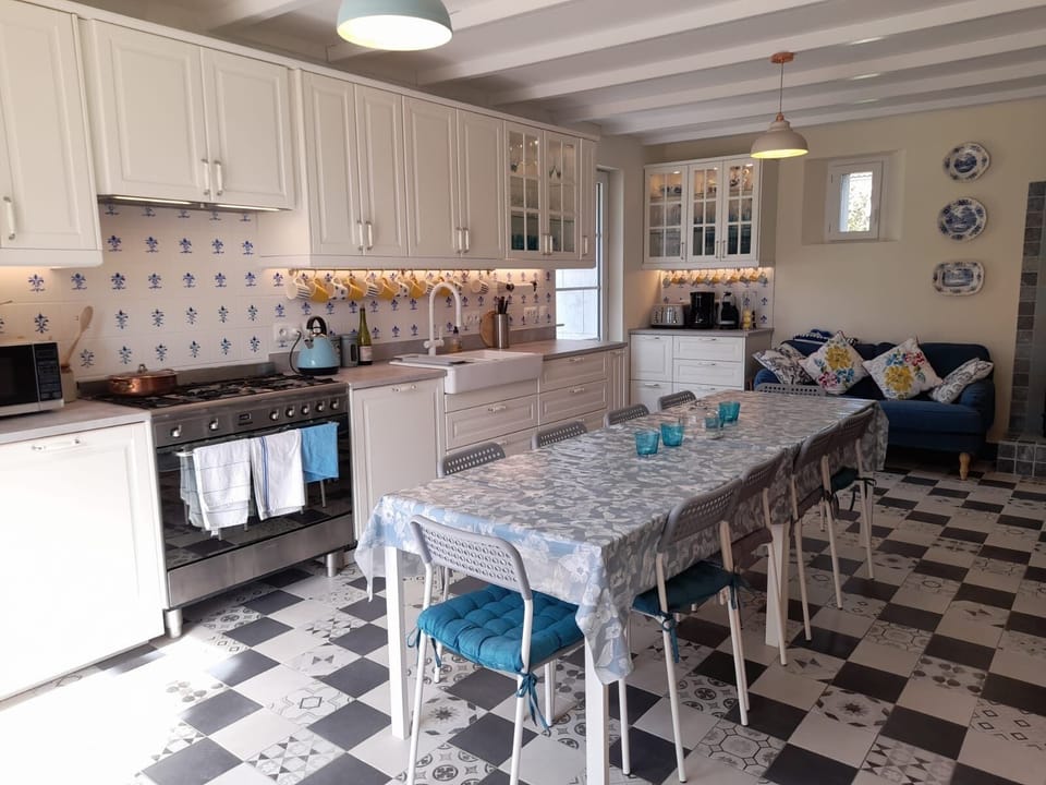 The superbly equipped kitchen is complete with two family sized dishwashers.
