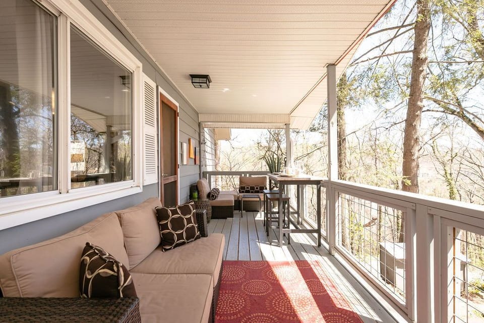 The Berne front porch with seating and dining area
