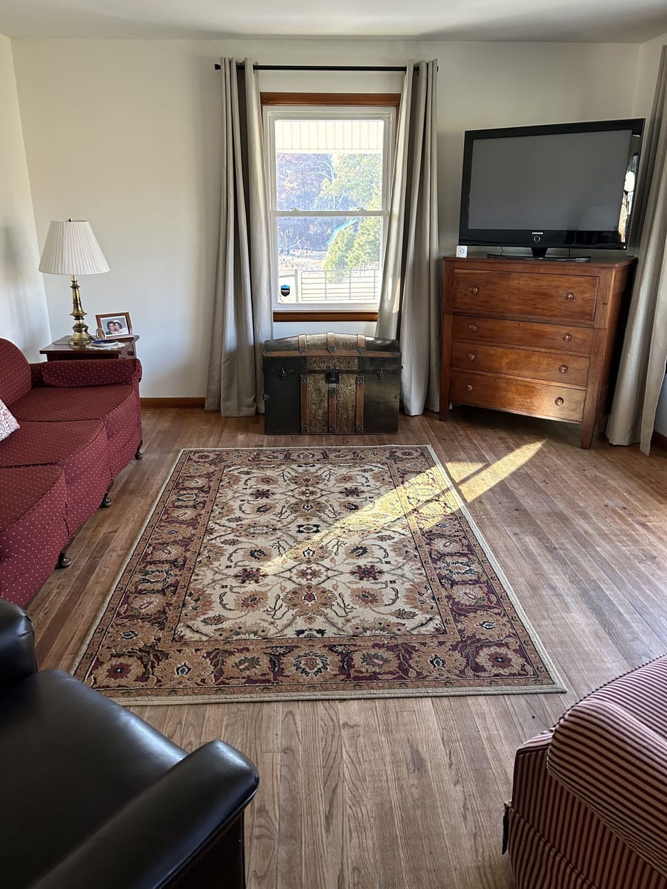 Large living room with smart TV for relaxing. 