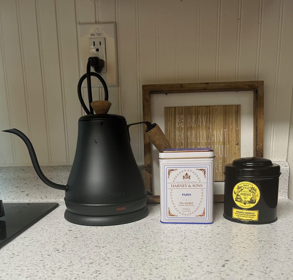 Tea station with gooseneck electric water kettle.  