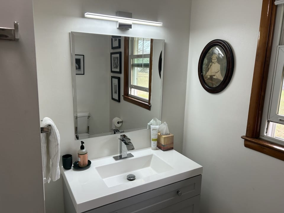Bathroom vanity with a good light for putting on makeup.