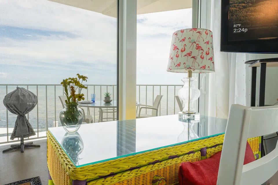 Bright and airy desk with a serene ocean view.