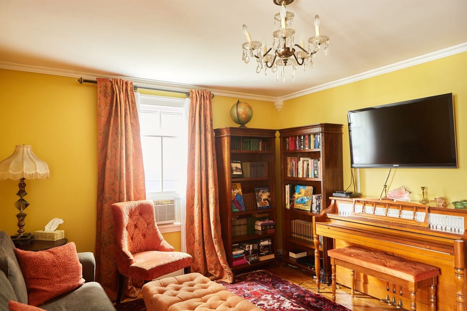 Our historic sitting room with piano.