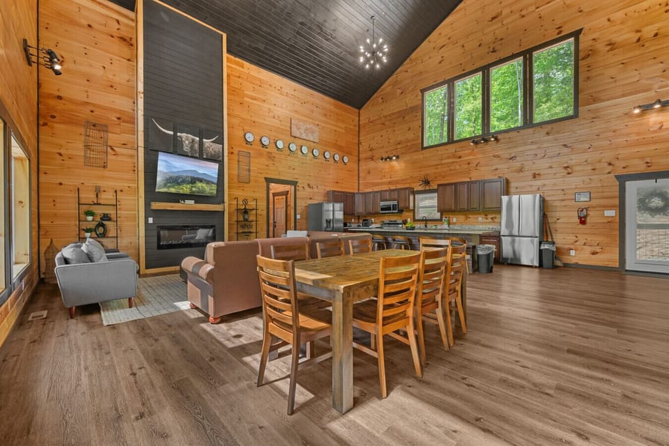 Spacious great room connecting kitchen, dining, and living.