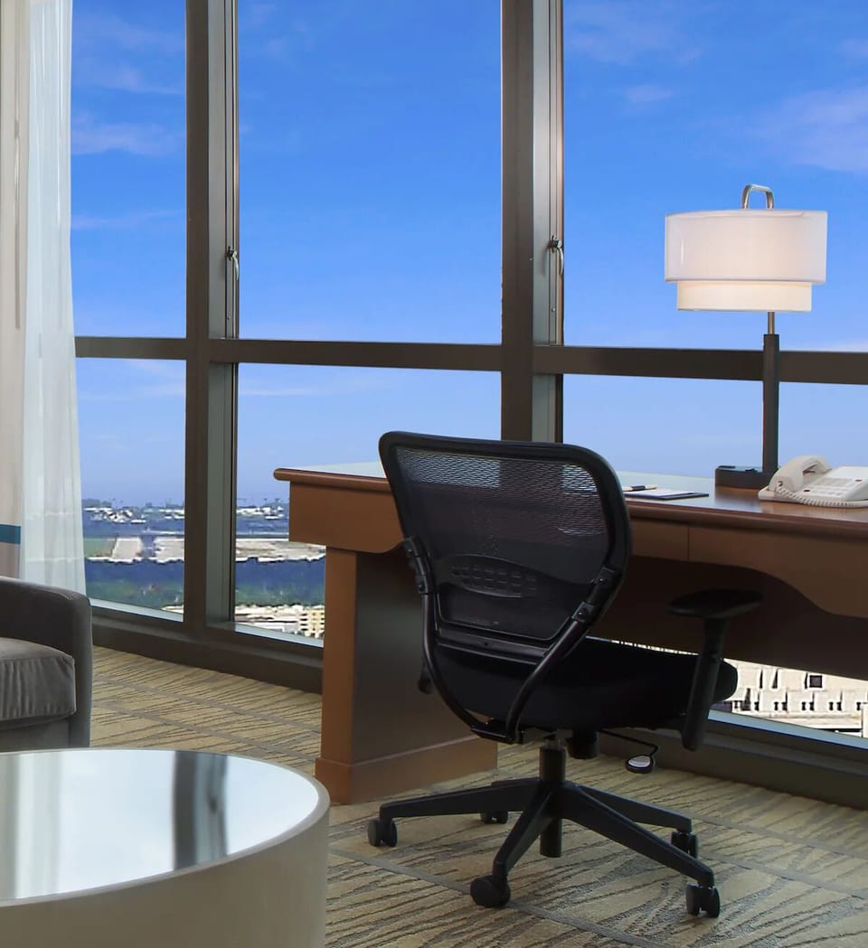 Start your morning with skyline views at the work desk.