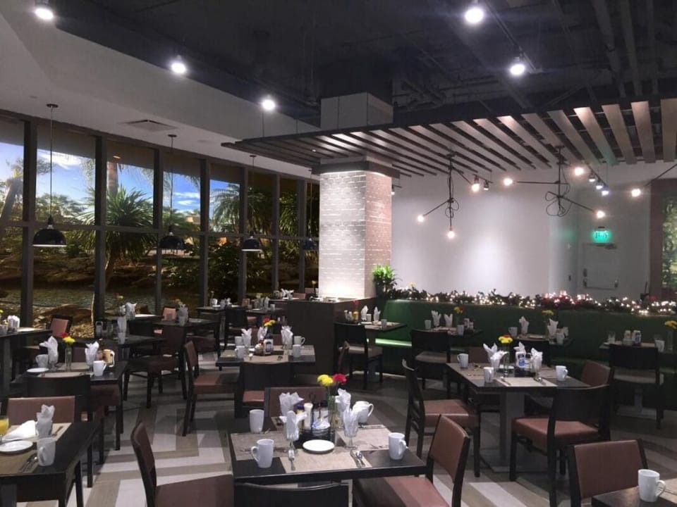 Savor relaxed meals in the stylish, light-filled on-site restaurant.