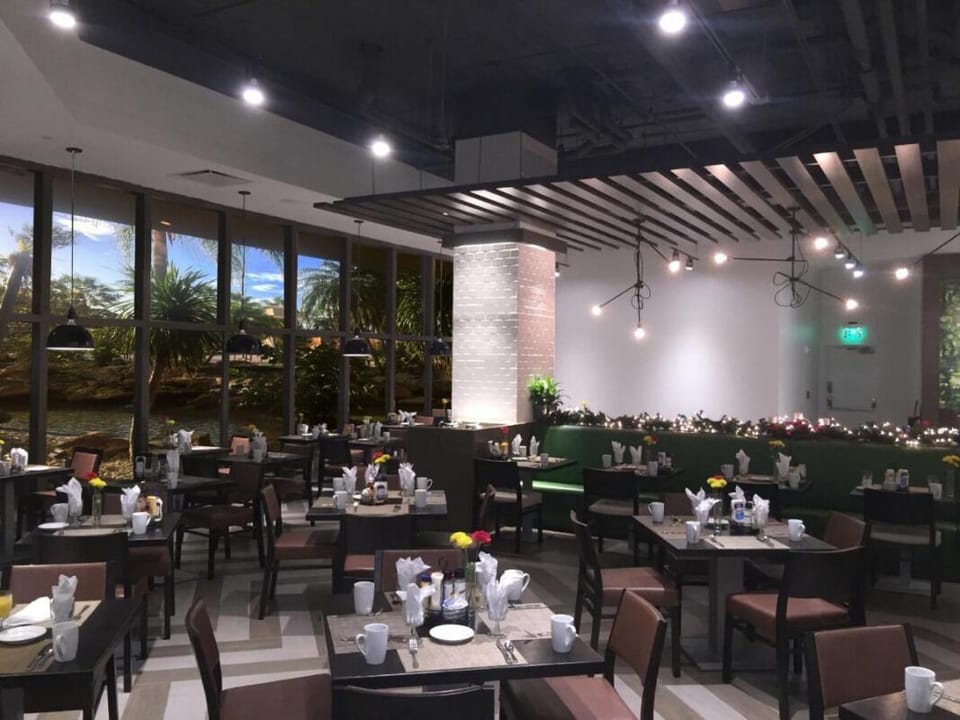 Savor relaxed meals in the stylish, light-filled on-site restaurant.