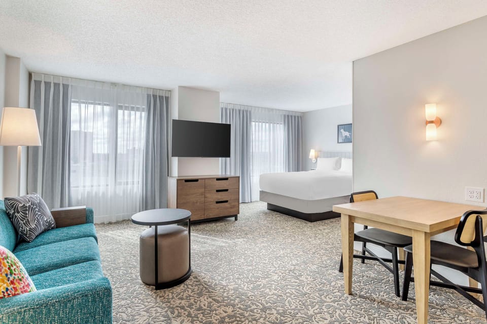 Spread out in the spacious suite with lounge and dining.