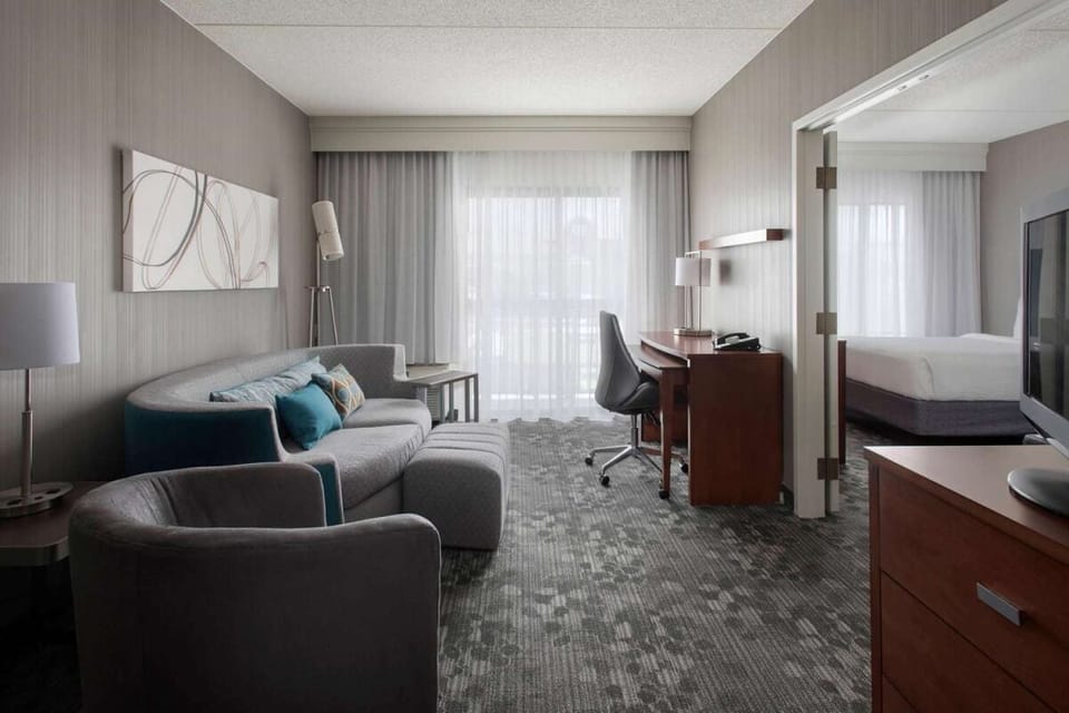 Settle into the spacious suite with lounge seating and desk.