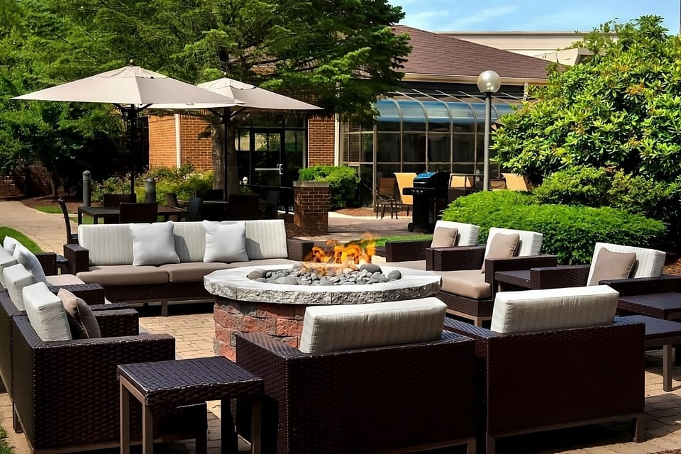 Gather outdoors around the fire pit for cozy evenings.