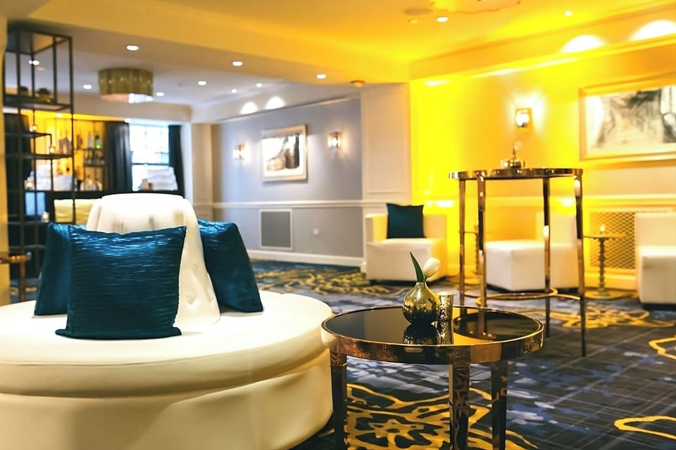 Gather for cocktails in a bright, stylish social hub.