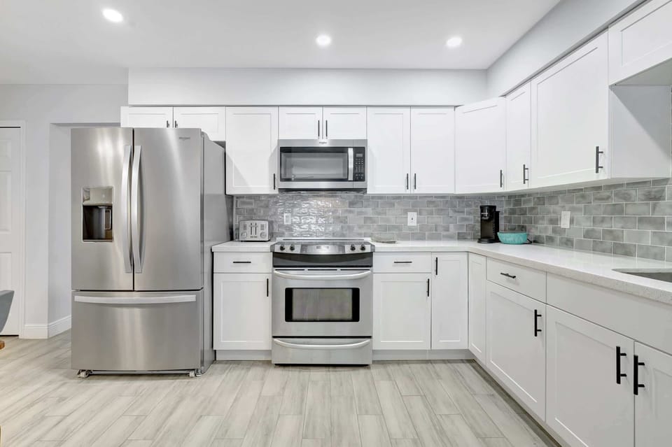 Our cottage features and updated kitchen with stainless steel appliances and quartz counters