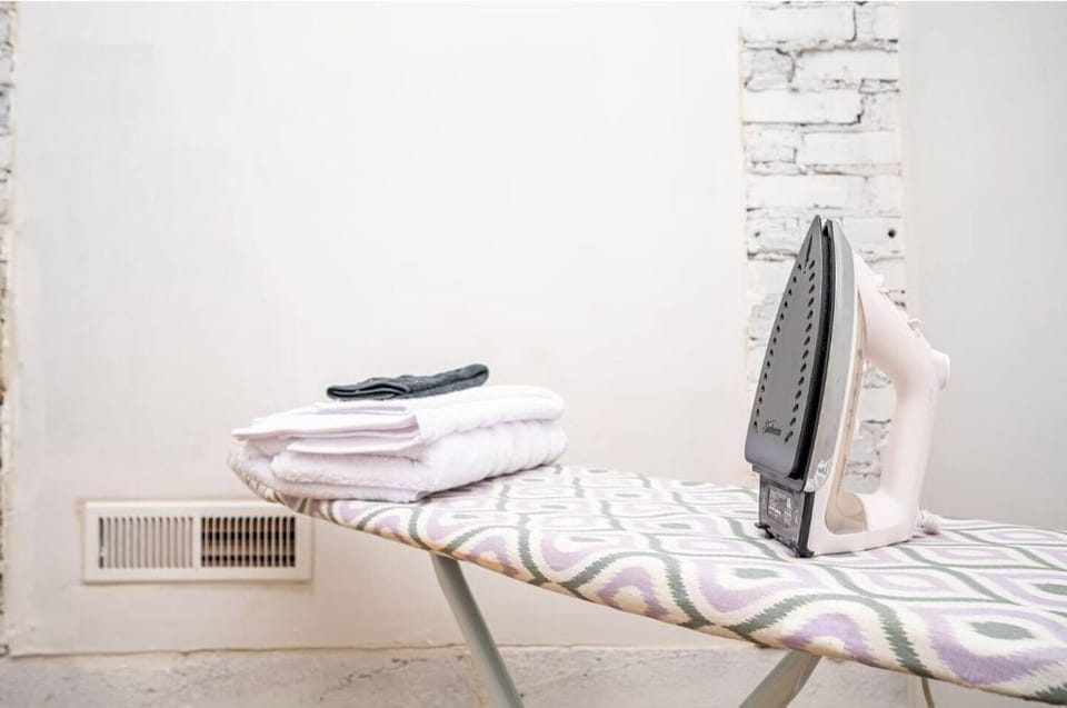 Iron and ironing board are available