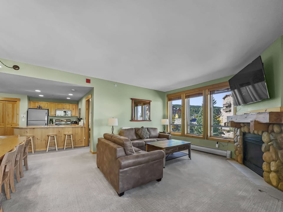 Open concept living, dining, and kitchen area.