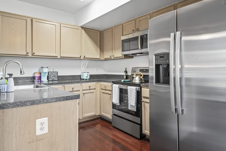 Brand-new stainless appliances adorn this modern kitchen.