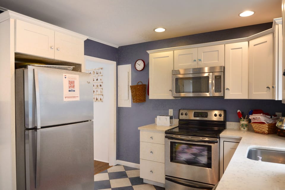 Small but mighty, this kitchen is well stocked and ready for you to prepare meals in if you like! There is also a gas grill for BBQ's!