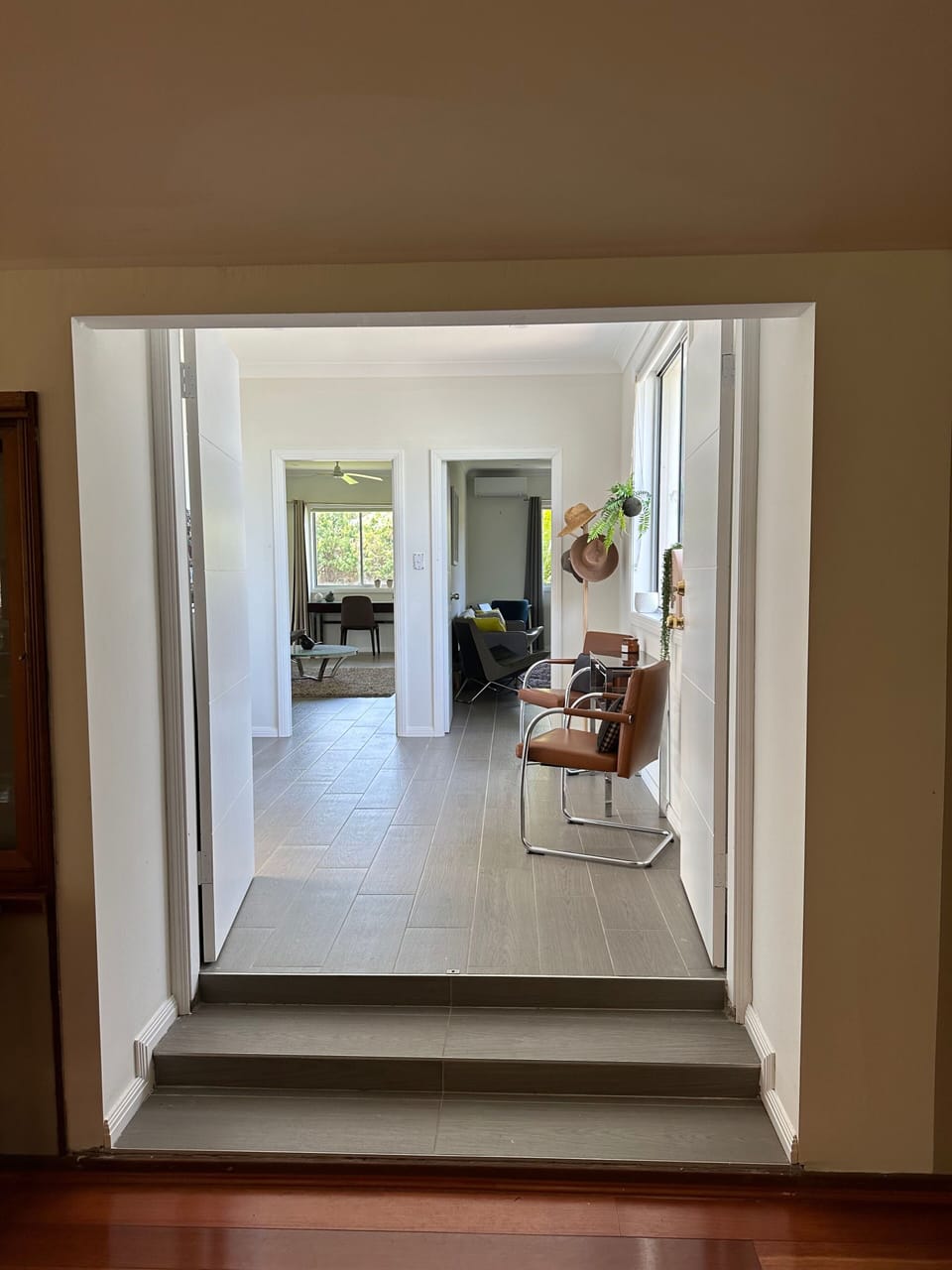 Hallway to two separate bedrooms and living areas