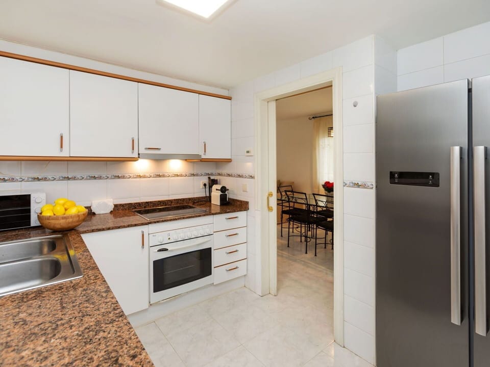 Cabinetry, Countertop, Furniture, Kitchen Stove, Kitchen, Wood, Interior Design, Kitchen Appliance, Home Appliance, Major Appliance