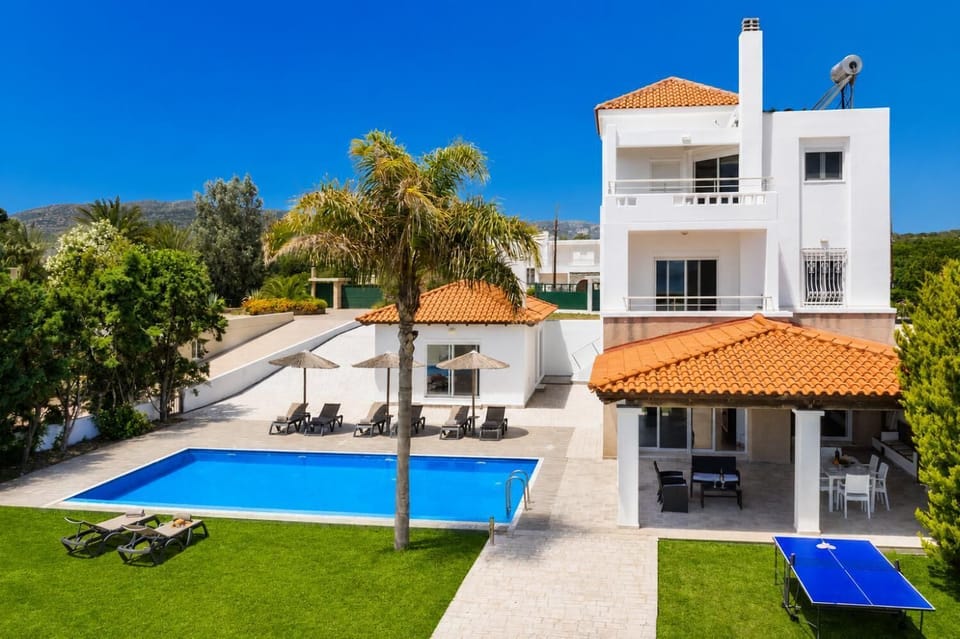 Beautiful villa with private pool, terrace, and garden with sea views