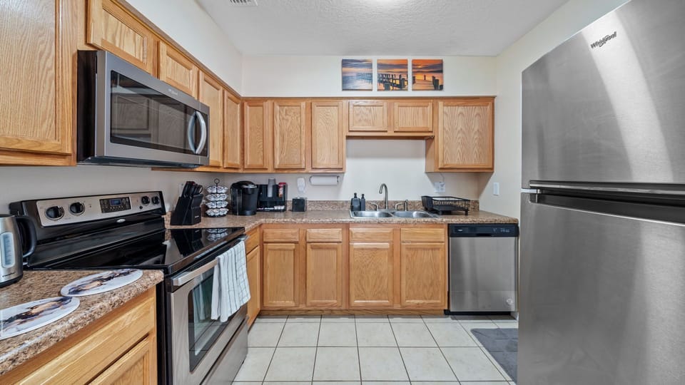Fully equipped kitchen with stainless appliances