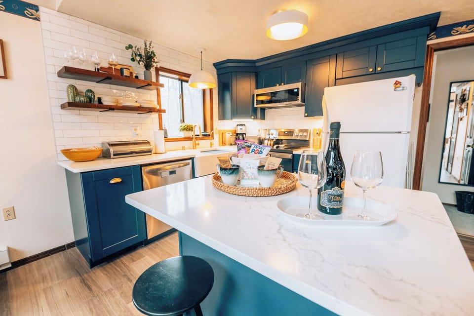 Renovated and stocked kitchen with a drip coffee machine, toaster & dishwasher. 