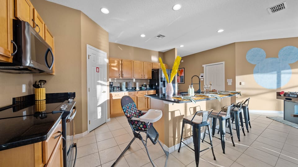 Kitchen island with bar seating for 4 plus high chair