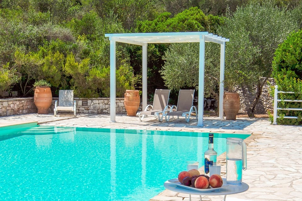 Sip on a poolside drink at Dionisis%2E
