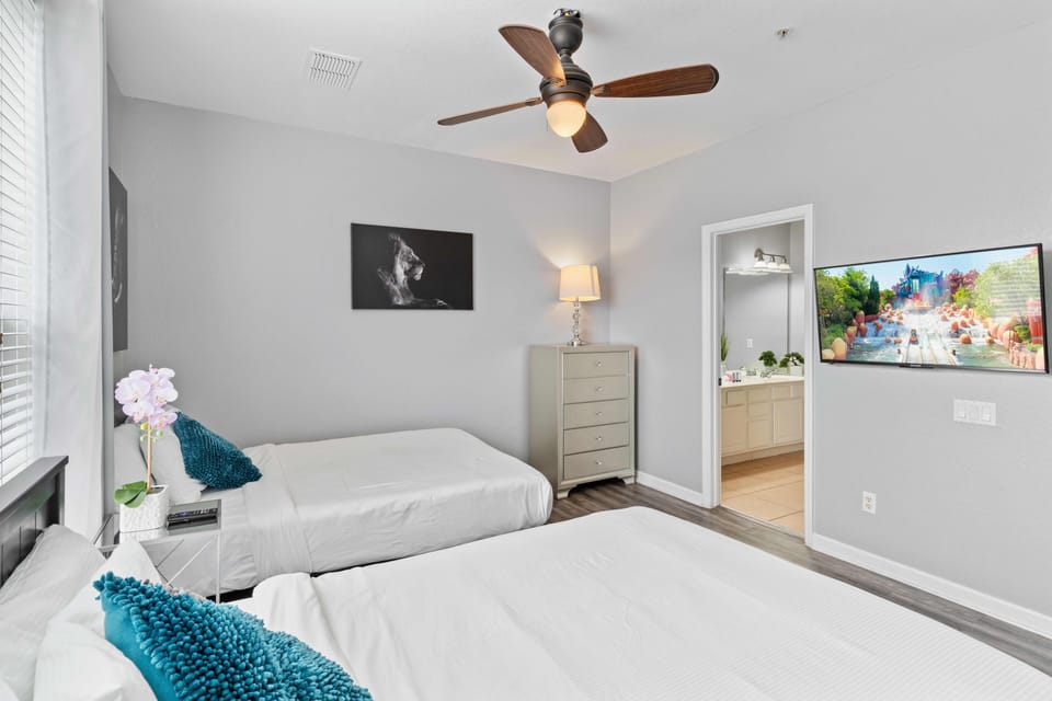 Bedroom suite 3 with 2 double size beds and attached bathroom